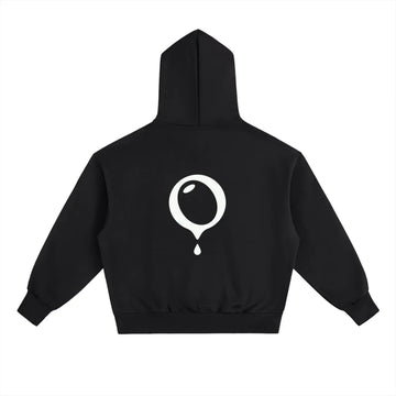 The HOJI HOODIE by Hoji is a heavyweight black hoodie shown from the back, featuring a large white drip logo shaped like a round droplet with a single drop falling at the center.